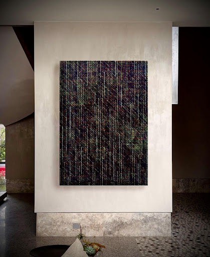 Fotografía de un cuadro en una sala